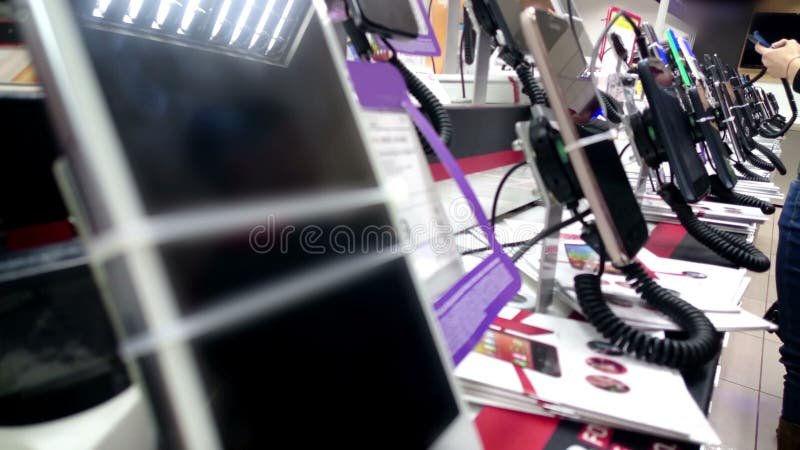 Gadget Showroom at Electronics Store, Buyers Testing and Choosing ...